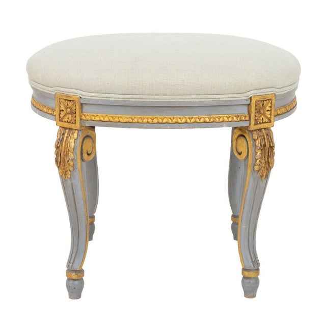 Louis XVI Style Painted Oval Foot Stool, light blue fluted cabriole legs and light green upholstery, with gilt decoration....
