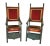 Pair of carved and upholstered Jacobean Armchairs. Chairs feature intricate hand-carving and are upholstered in rich...