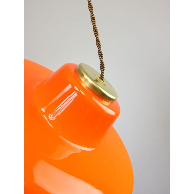 Lamp's cover is made of genuine brass material complementing this vintage item nicely with it's golden colour. total...