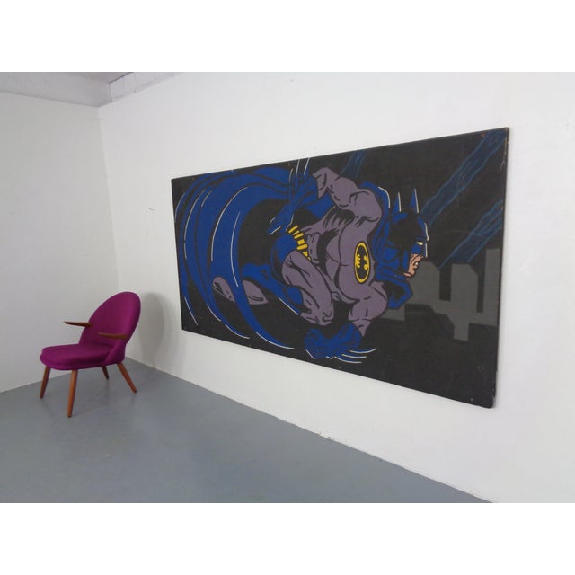 Huge street art image of Batman made with acrylic paint on hardboard.