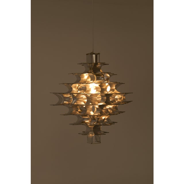 A 'Cassiopée' (Cassiopeia) pendant lamp designed by French designer Max Sauze around 1970 and manufactured in his own...