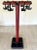Red and black design coat rack 1980s emblematic design of the 80s. Very stable cast iron base.