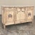 Antique French Louis XVI Marble Top Step-Front Buffet in Stripped Oak makes a classic yet casual visual statement perfect...