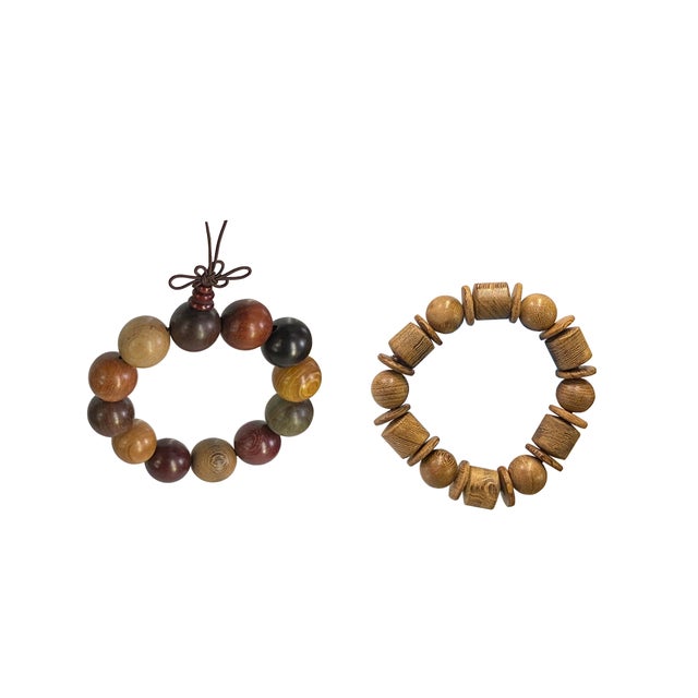 This is a set of two rosary / praying bracelets with natural mixed brown color beads. It uses a semi-elastic string and no...