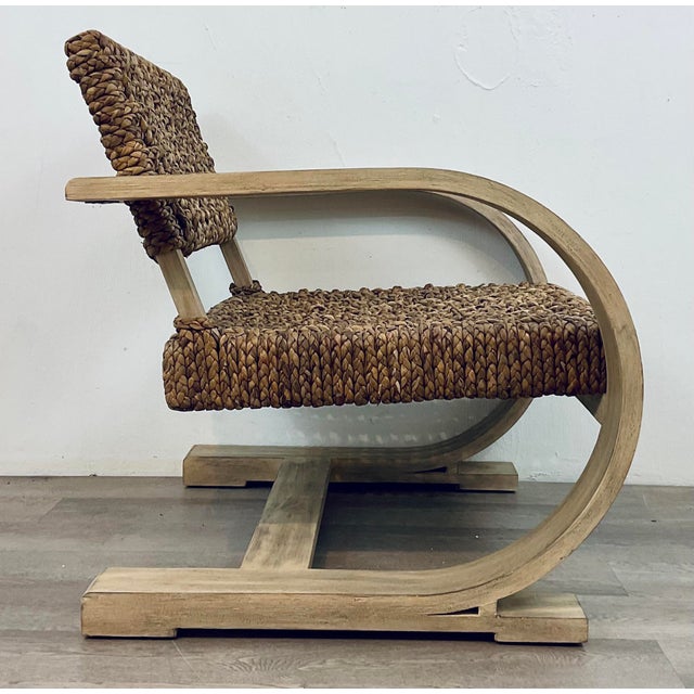 Stylish Organic Modern Woven Hyacinth Rehema Accent Chair, light wood frame, showroom floor sample