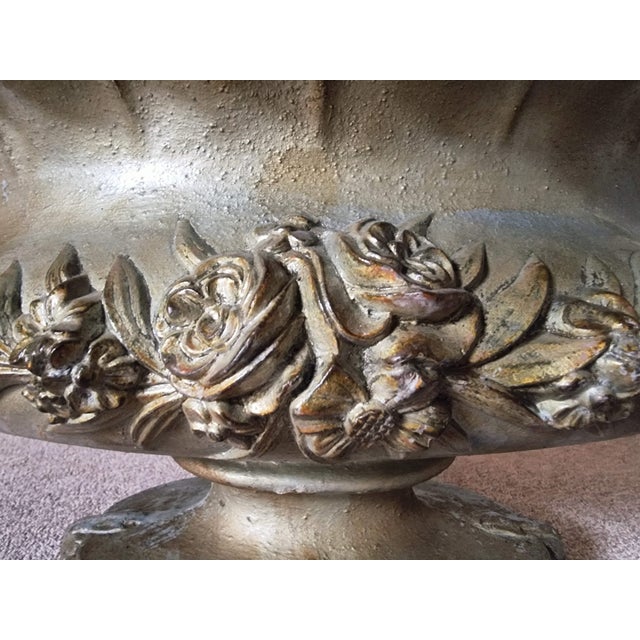 Large antique cast iron jardinière, originating from France and dating to the period circa 1900. The jardinière features...