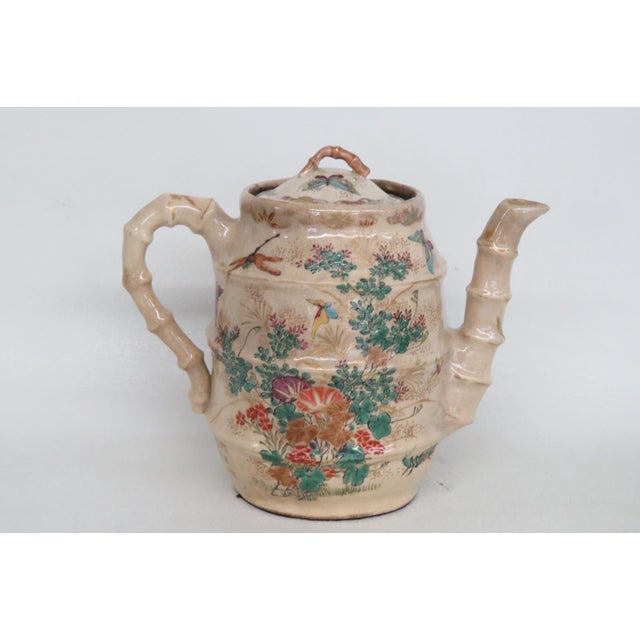 This gorgeous Tea Pot is made out of ceramic Earthenware. It presents a stunning Japanese Satsuma-style design with hand...