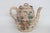 This gorgeous Tea Pot is made out of ceramic Earthenware. It presents a stunning Japanese Satsuma-style design with hand...