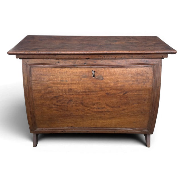 Walnut and Oak Bombé Front Antique Walnut Chest An exceptional antique walnut and oak chest featuring a rich bombe front,...
