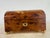 This is a handsome handcrafted burled walnut music box. This dome shaped box is handcrafted with burled walnut satin wood...