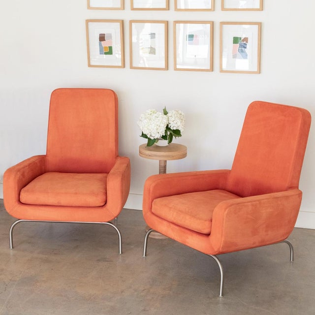 Fantastic pair of Italian armchairs by Rodolfo Dordoni for Minotti. Great curved lines on arms and base with single seat...