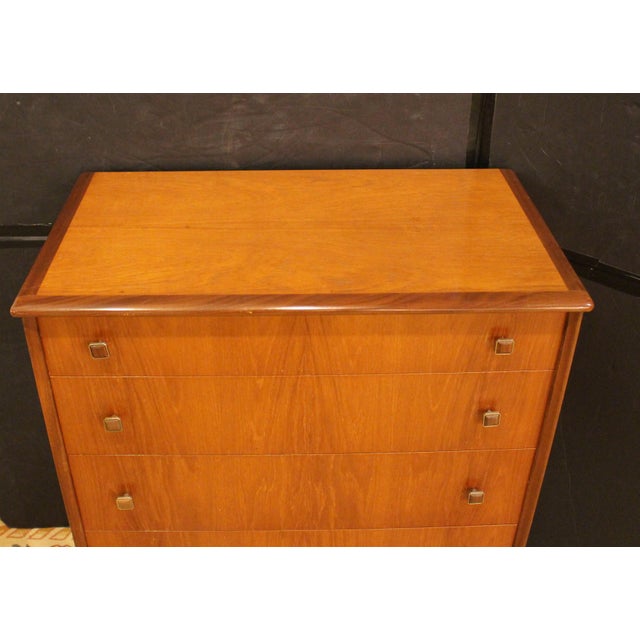 English circa 1960s chest of drawers by Homeworthy. Mid century modern. Teak & teak veneers with particularly stylish...