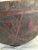 A large carved bowl from the Nupe or Hausa people from a large gourd. Incised geometric design with scattered red and...
