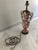 Old multi-colored Table Lamp with brass base and top, with embossed surface and side handles. Includes electrical wiring...