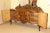 Exceptional European Art Deco sideboard dating to the 1930s, featuring a beautifully bookmatched walnut burl veneer...
