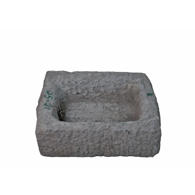 This stone trough is hand carved out one piece of stone and hand chiseled by the locals. This hand made stone planter is...