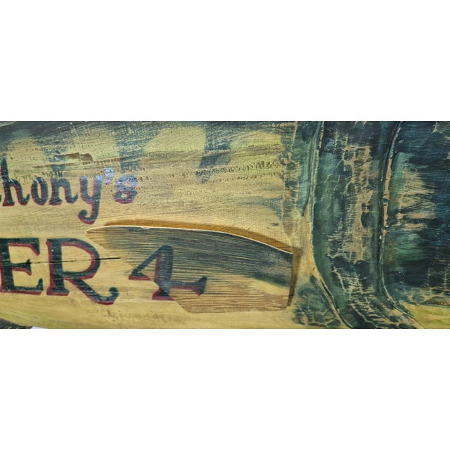 Six foot carved Atlantc tuna trade sign with handpainted distressed finish. Lettering reads "Anthony's Pier 4". Carved...