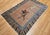 This exceptional vintage Chinese pictorial area rug captures a moment of raw movement and narrative depth—depicting a...