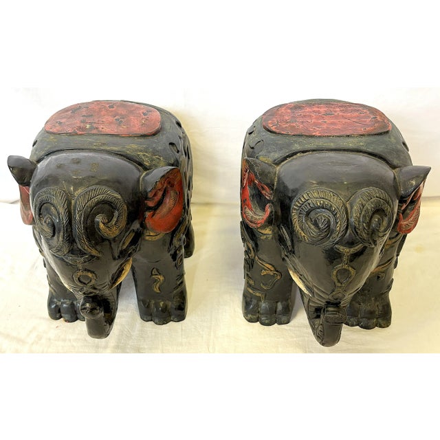 Special pair of vintage African elephant stools from the mid 20th century. The pair are hand carved of solid wood and have...