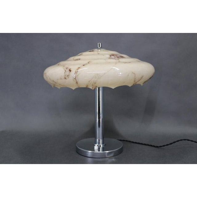 This elegant czechoslovak art deco table lamp dates from the 1930s and reflects the refined material combinations typical...