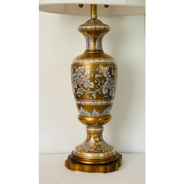 Large impressive Antique American Marbro Co lamp in gold leaf porcelain on a bronze base.