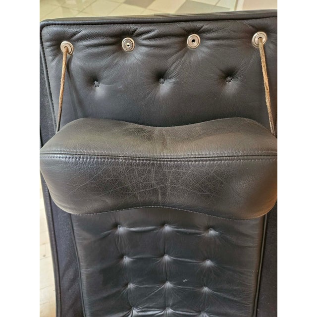 A striking pair of Italian lounge chairs from the 1970s, combining bold sculptural form with exceptional comfort. These...