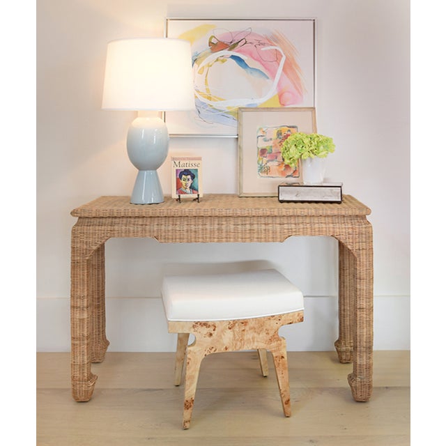 New special order item. The crisp, tailored white linen cushion and distinctive burl wood veneer on the modernist,...