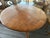 This Antique French Fruitwood Round Kitchen Dining Table is a beautifully crafted piece that exudes elegance and charm....
