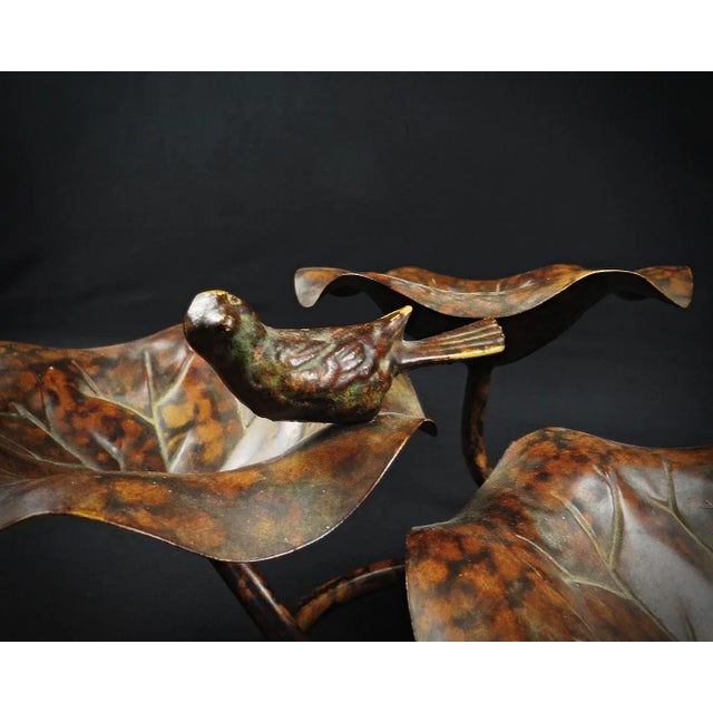 Three-tiered patinated metal bird bath, lotus leaf shape Because our beloved little winged garden dwellers deserve a...