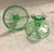Vintage pair of light green depression glass pillar holders. Perfect paired with other green glass designs. Also just in...