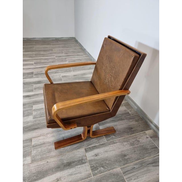Czechoslovakian Armchair by Ludvik Volak for Holes Tree, in Worn conditions. Designed 1960 to 1969 This piece is...