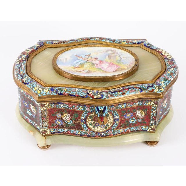 A superb quality French Porcelain-Mounted Champlevé enamel and Onyx Casket, circa 1870 in date. The stunning casket is of...