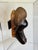 A Baule People carved wood portrait mask. Ivory Coast from the mid 20th century. Encased in museum quality lucite display....