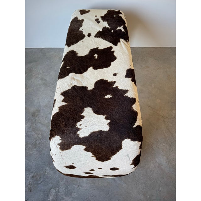 For your consideration we are presenting for sale this fantastic Vintage cowhide upholstered waterfall bench. This...