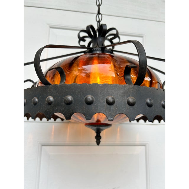 Spanish Revival Mid 20th Century Vintage Amber Glass and Metal Swag Light For Sale - Image 3 of 6