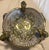 A Gualdo Tadino ceramic centerpiece bowl from Italy, on a white and cream ground with blue, green, and yellow floral...