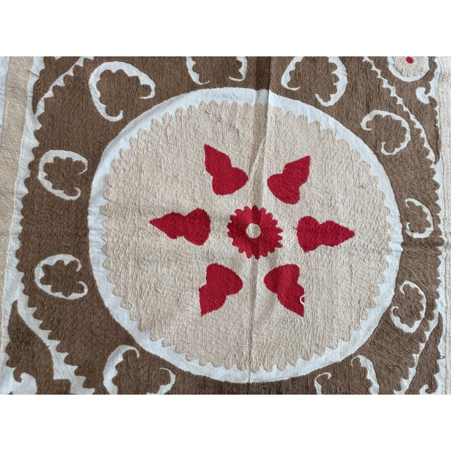 Hand-Embroidered Suzani from Uzbekistan, circa early 1960s. Dimension; 48'' x 51'' inches / 122 x 130 cm / 4'0'' x 4'3''...
