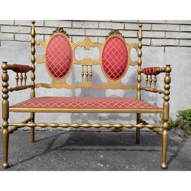 Incredible Victorian window bench, loveseat, all gilded, with a padded back, seat, and armrests, newly upholstered in a...