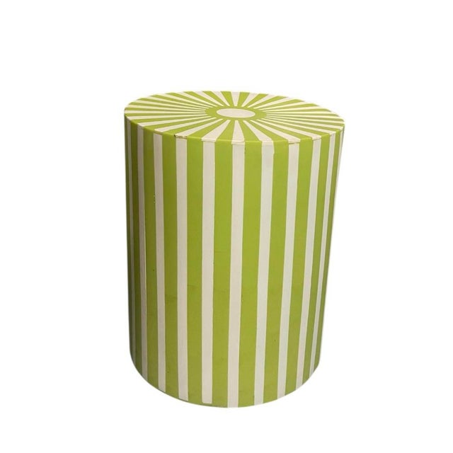 A handcrafted Moroccan side table. Constructed from a solid wood base and meticulously finished with a sleek resin inlay,...