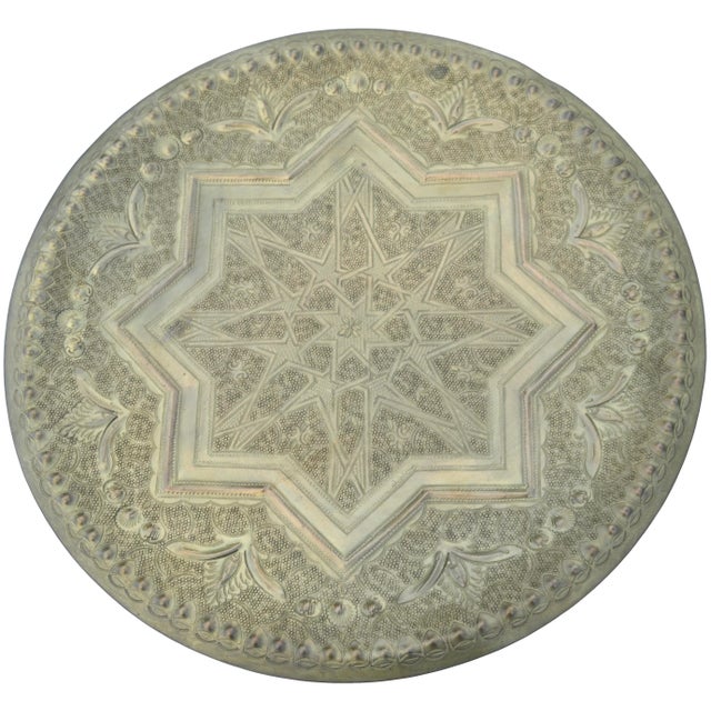 Antique highly crafted, engraved and detailed Moroccan tray. Constructed of solid brass with intricate multi-dimensional...