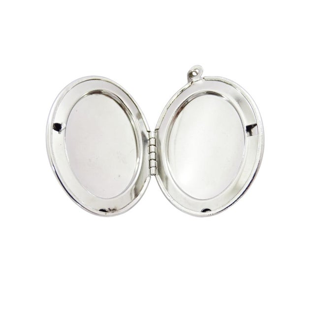 Beautiful reliquary pendant in silver metal and blue enamel with stylized floral motifs, inspired by Art Nouveau and...