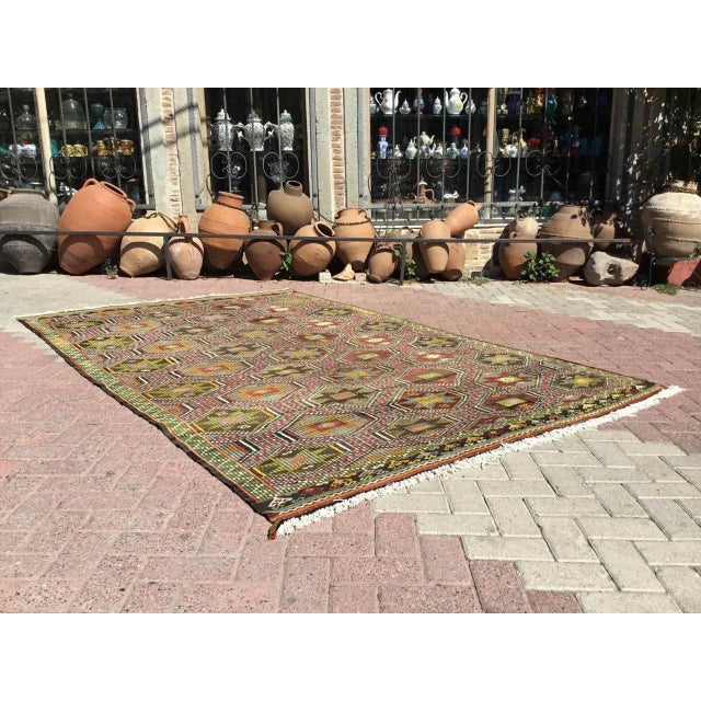 This beautiful, vintage, handwoven kilim is approximately 50 years old. It is handmade, of very fine quality hand spun...