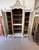 large French louis XVI 3 door bookcase or Armoire made of solid walnut. The wood has the original French paint from the...