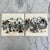 Set of 4 vintage tiles handpainted in Munich, Germany. Features two different scenes. Each tile measures approximate 6”...