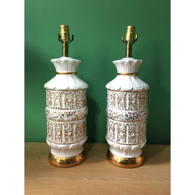 RELOCATION SUPER SALE! HUGE MARK DOWNS Pair of vintage table lamps, circa 1950s. White ceramic embossed pattern, lightly...