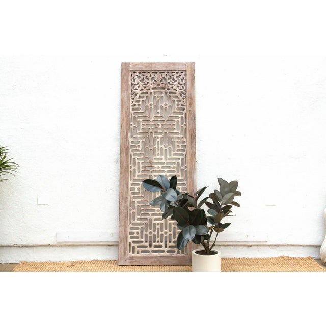 Experience the rhythmic beauty of Southeast Asian wood charm with this carved lattice door. Reconstructed from massive...