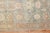 A scatter size early 20th century Persian Malayer rug in washed-out neutral tones Measures: 2'10" x 4'8".