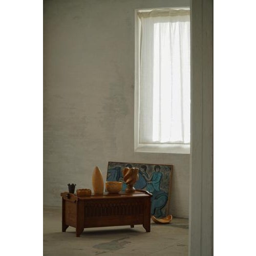 This exceptional chest is a fine example of traditional Danish woodworking, executed in solid oak with richly detailed...