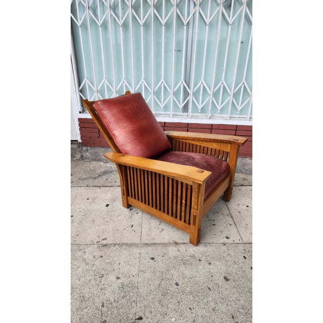 Authentic Stickley Mission-style lounge chair and ottoman set. This set is crafted from solid quartersawn white oak with a...