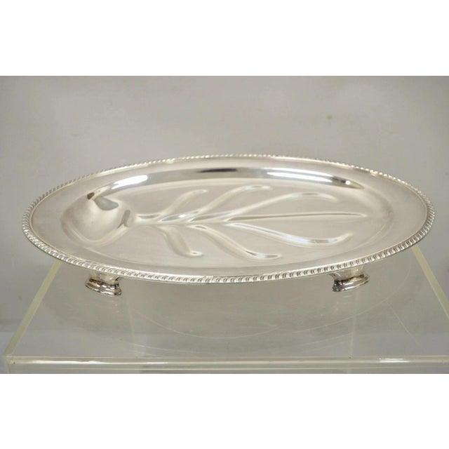 Vintage Regency Style Silver Plate 18" Oval Footed Meat Tray Platter WM Rogers. Item featured is raised on feet, decorated...